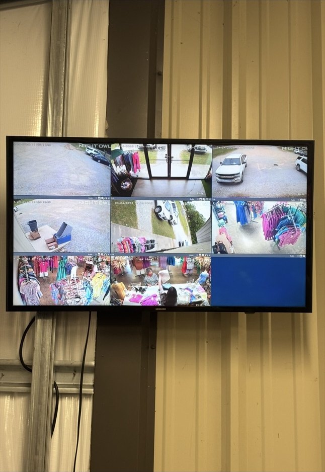 Security camera viewing monitor showing multiple camera angles