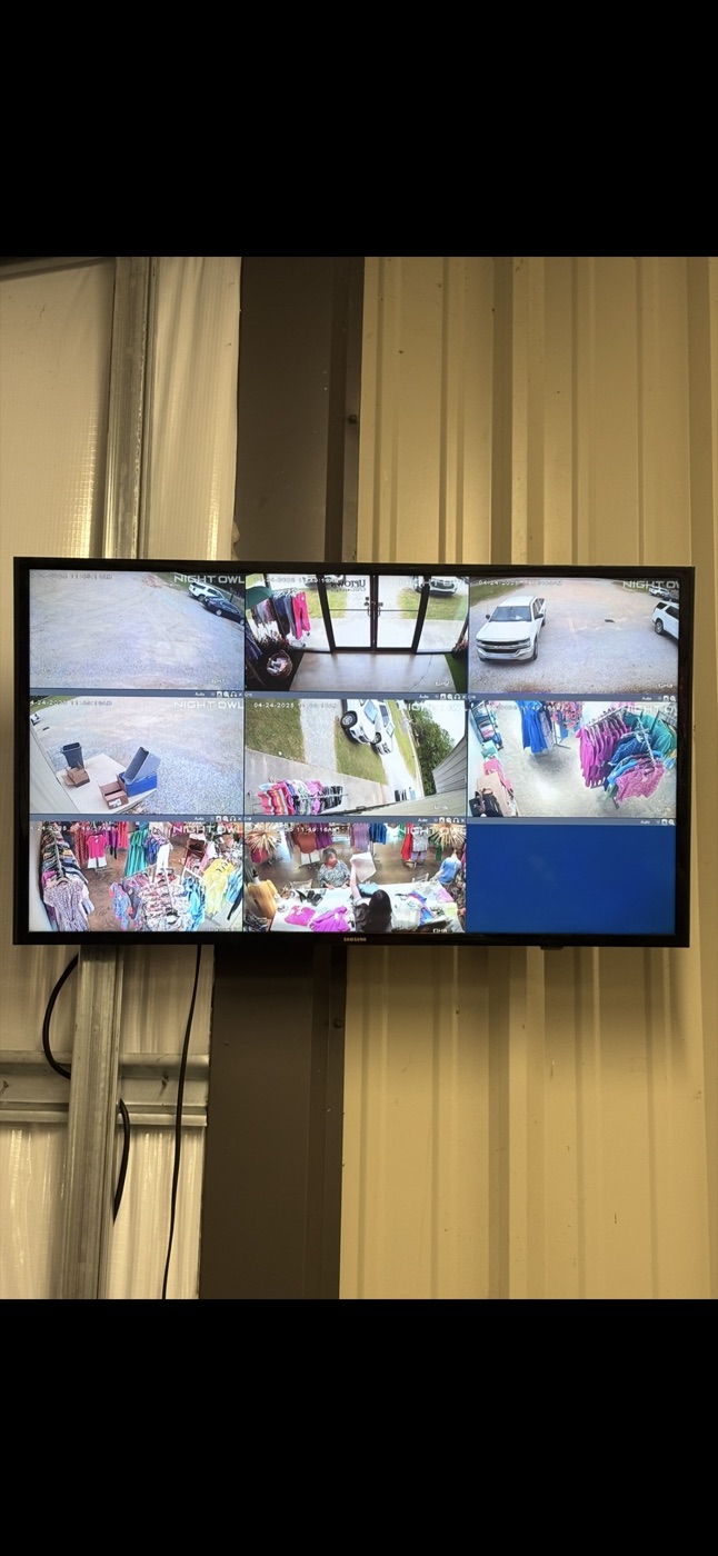 Security camera viewing monitor showing multiple camera angles